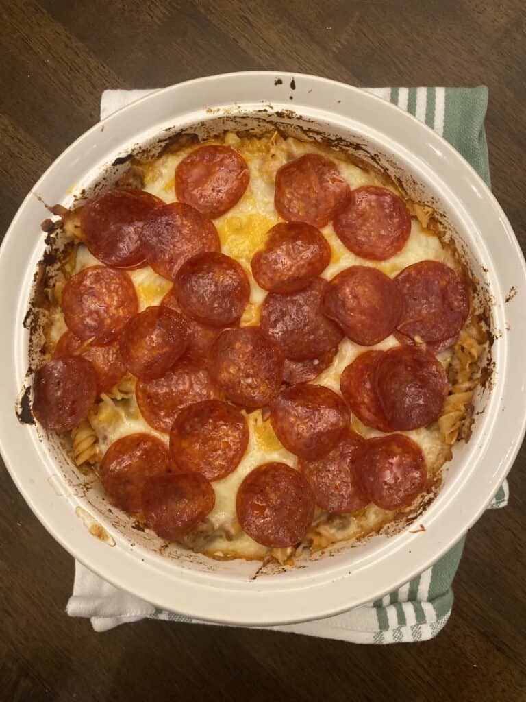 Make this easy and cheesy pre-chore meal prep before you head out for your next chores or busy night. Enjoy this pizza casserole!